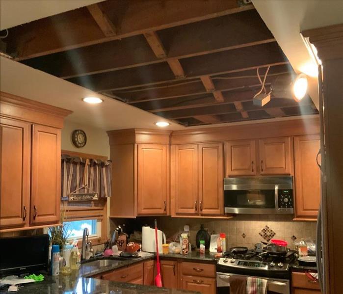 Kitchen ceiling cut out with framework exposed 