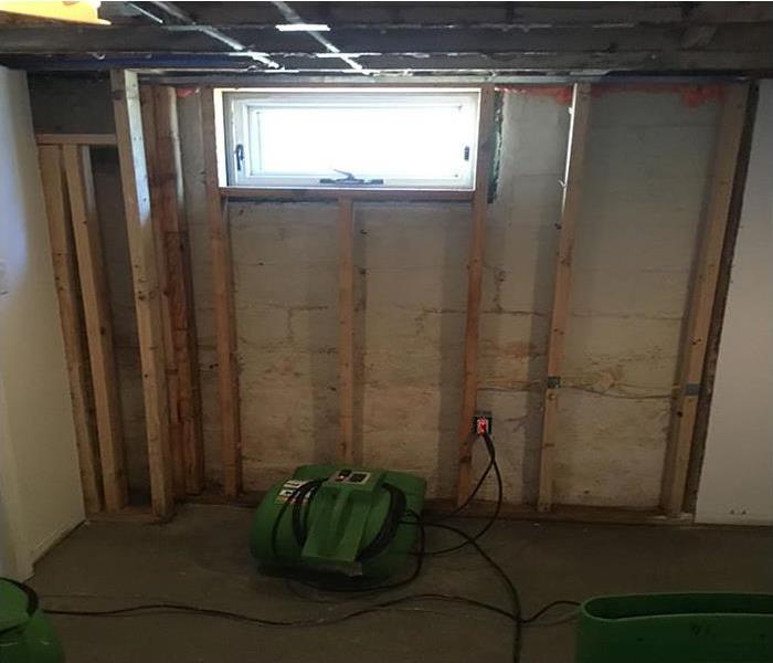 exposed wall allowing equipment to dry water damage area